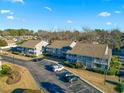 Aerial perspective of condo building and parking at 4714 Cobblestone Dr. # L2, Myrtle Beach, SC 29577