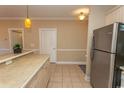 Kitchen with stainless steel refrigerator and light cabinets at 4809 Luster Leaf Circle # 102, Myrtle Beach, SC 29577