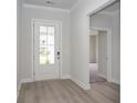 Bright entryway with light flooring and a view to an additional room at 7085 Shooting Star Way, Myrtle Beach, SC 29579