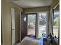 Inviting front door entrance with sidelights and view of walkway at 800 Egret Circle # 45, Little River, SC 29566