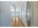 Bright entryway with light blue walls and hardwood floors at 1600 Gibson Ave., Myrtle Beach, SC 29575