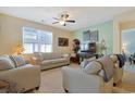 Spacious living room featuring neutral colors and ample seating at 191 Ocean Commons Dr., Surfside Beach, SC 29575