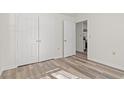Bedroom with double doors leading to the kitchen at 4251 Villas Dr. # 303, Little River, SC 29566