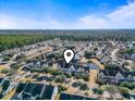 Townhome community with pond and surrounding homes at 537 Uniola Dr. # 537, Myrtle Beach, SC 29579