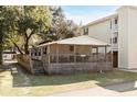 Single-story home with large deck and fenced yard at 6001-Mh53 S Kings Highway, Myrtle Beach, SC 29575
