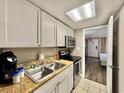 Well-equipped kitchen featuring stainless appliances and modern fixtures at 6900 N Ocean Blvd. # 1234, Myrtle Beach, SC 29577
