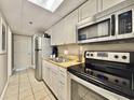 A modern kitchen featuring stainless steel appliances and granite countertops at 6900 N Ocean Blvd. # 1234, Myrtle Beach, SC 29577