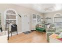Bright and airy living room with hardwood floors and comfy seating at 727 Cypress Dr., Surfside Beach, SC 29575