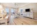 Living room with ocean view, light flooring, and comfy seating at 8500 Margate Circle # 606, Myrtle Beach, SC 29572