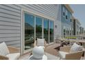 Deck with wicker furniture, providing outdoor living space at 8579 Balmy Breeze Pl. # 43, Myrtle Beach, SC 29572