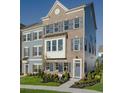 3-story townhouse with brick and siding exterior, landscaping and walkway at 8579 Balmy Breeze Pl. # 43, Myrtle Beach, SC 29572