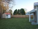 Fenced backyard with shed and patio at 9215 Greeneedle Pl., Murrells Inlet, SC 29576
