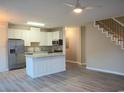Modern kitchen with island and stainless steel appliances at 9215 Greeneedle Pl., Murrells Inlet, SC 29576