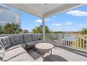 Relaxing outdoor space with sectional sofa and ocean views at 1187 Norris Dr., Pawleys Island, SC 29585