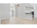 Open living area with high ceilings, ceiling fan and hardwood floors at 1727 Cane Branch Rd., Loris, SC 29569