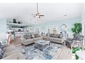 Spacious living room with light blue walls and hardwood floors at 204 24Th Ave. N, North Myrtle Beach, SC 29582