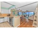 Open kitchen with ocean view and stainless steel appliances at 2511 S Ocean Blvd. # 1601, Myrtle Beach, SC 29577