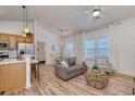 Inviting living room with modern furnishings and natural light creates a cozy atmosphere for relaxation and entertainment at 502 Castellar Ln., Little River, SC 29566