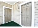 Exterior entryway with two doors and neutral color scheme at 6015 Catalina Dr. # 431, North Myrtle Beach, SC 29582