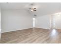 Spacious living room featuring vaulted ceilings and light hardwood-look floors at 643 Woodside Dr., Conway, SC 29526