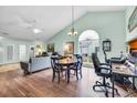 Open-concept living room with dining area, lots of light, and comfortable seating, ideal for entertaining at 6716 Wisteria Dr., Myrtle Beach, SC 29588