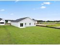 Spacious backyard of a new construction home with grassy area at 1036 Kinness Dr., Conway, SC 29527