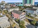 Bright and airy beach house with a dual balcony near the ocean at 124 Rainbow Dr., Murrells Inlet, SC 29576