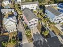 Charming beach house with a dual balcony and a long driveway for multiple cars at 124 Rainbow Dr., Murrells Inlet, SC 29576