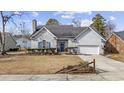 Charming one-story home with brick facade and attached garage at 125 Ashton Circle, Myrtle Beach, SC 29588