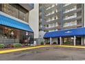 Building entrance with access to shops and amenities at 2001 S Ocean Blvd. # 1401, Myrtle Beach, SC 29577