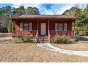 Red Ranch home with front porch and walkway at 2855 Highway 19, Conway, SC 29526