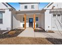 Inviting front entrance featuring natural wood columns, well-maintained landscaping, and a welcoming walkway to the front door at 3647 Allentown Dr., Conway, SC 29526