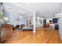 Open living space with hardwood floors and dining area at 37 Caulder Ln., Pawleys Island, SC 29585