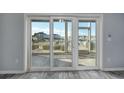 Waterfront view from sliding glass doors leading to a balcony at 4200 Coquina Harbour Dr. # H3, Little River, SC 29566