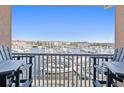 Breathtaking marina views from the condo's balcony with seating, a great spot to unwind at 4609 Lightkeepers Way # 11J, Little River, SC 29566