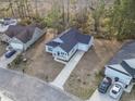 Aerial view of a house and neighborhood, showcasing the property's location at 508 Truitt Dr., Longs, SC 29568