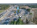 An aerial view showcasing the house's location in a residential community at 508 Truitt Dr., Longs, SC 29568