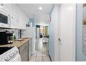 Small condo kitchen with granite countertops and appliances at 7000 N Ocean Blvd. # 326, Myrtle Beach, SC 29572