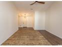 A bright and airy entrance hall with hardwood floors and a view to the living room at 9594 Sullivan Dr., Murrells Inlet, SC 29576