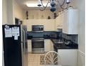 Bright kitchen with stainless steel appliances at 9764 Leyland Dr. # 7, Myrtle Beach, SC 29572
