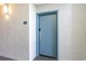 Private condo entry with light blue door and number 371 at 2311 South Ocean Blvd. # 371, Myrtle Beach, SC 29577