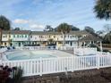 Community pool with gazebo and surrounding white fence at 3866 Highway 17 Business # C-3, Murrells Inlet, SC 29576