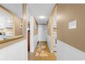 Interior hallway with access to kitchen and bedroom at 601 Mitchell Dr. # 1107, Myrtle Beach, SC 29577