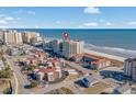 Aerial view showcasing Mar Vista Grande's beachfront location and surrounding buildings at 603 S Ocean Blvd. # 1103, North Myrtle Beach, SC 29582