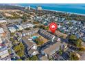 Aerial view showing building location near beach and amenities at 7700 Porcher Dr. # 4202, Myrtle Beach, SC 29572