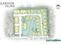 Aerial view of Sunnyside Village community layout, showing building locations and a pond at 81 Delray Dr. # 2-C, Murrells Inlet, SC 29576