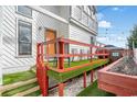 Private deck with artificial turf and raised garden bed at 1521 Edge Dr., North Myrtle Beach, SC 29582