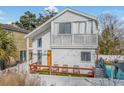 Two-story house with balcony, deck, and swimming pool in backyard at 1521 Edge Dr., North Myrtle Beach, SC 29582