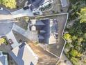 Overhead perspective of a home displaying its roof, landscaping, and surrounding property lines at 2113 Clematis Ct., Myrtle Beach, SC 29579
