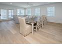 Spacious dining area with seating for ten and direct access to the balcony at 229 South Waccamaw Dr., Garden City Beach, SC 29576